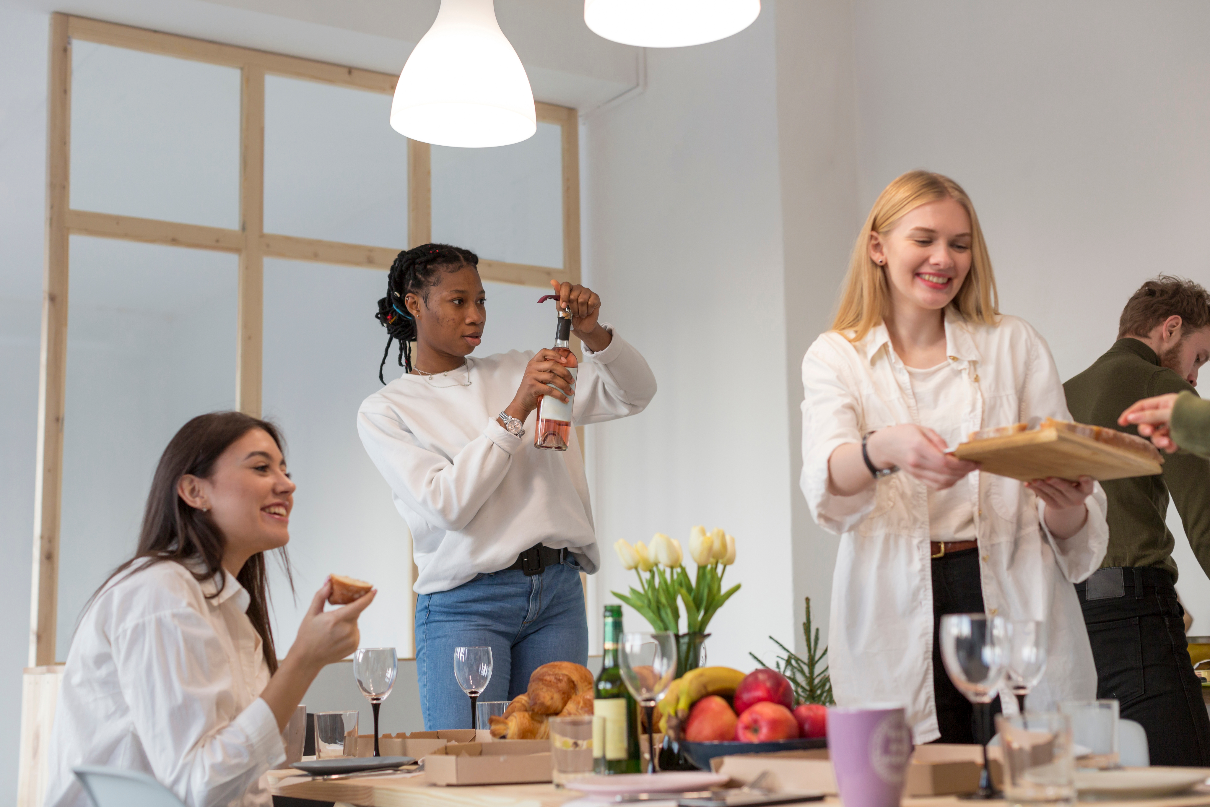 Low angle womens having lunch home