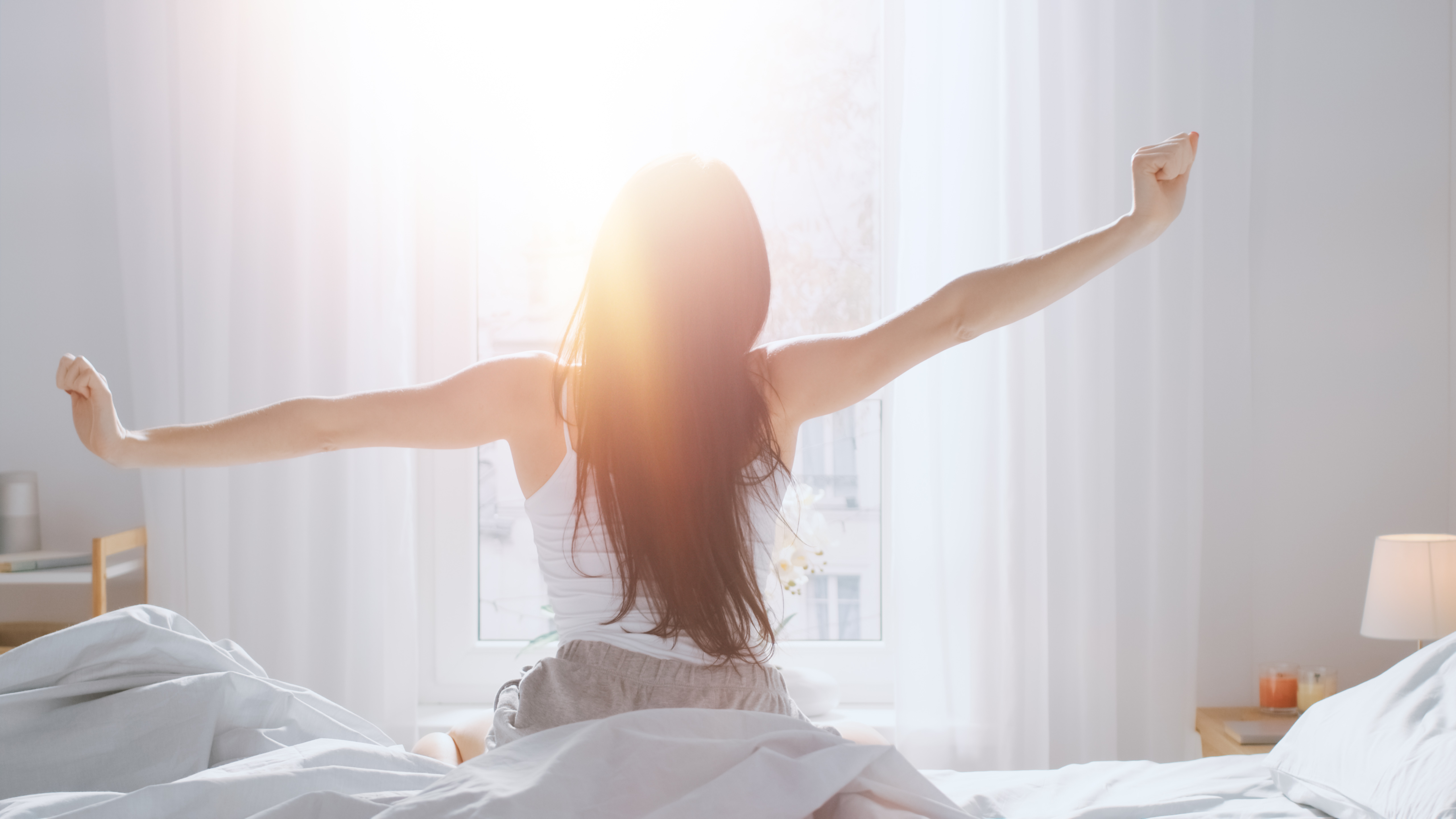 Woman waking up refreshed