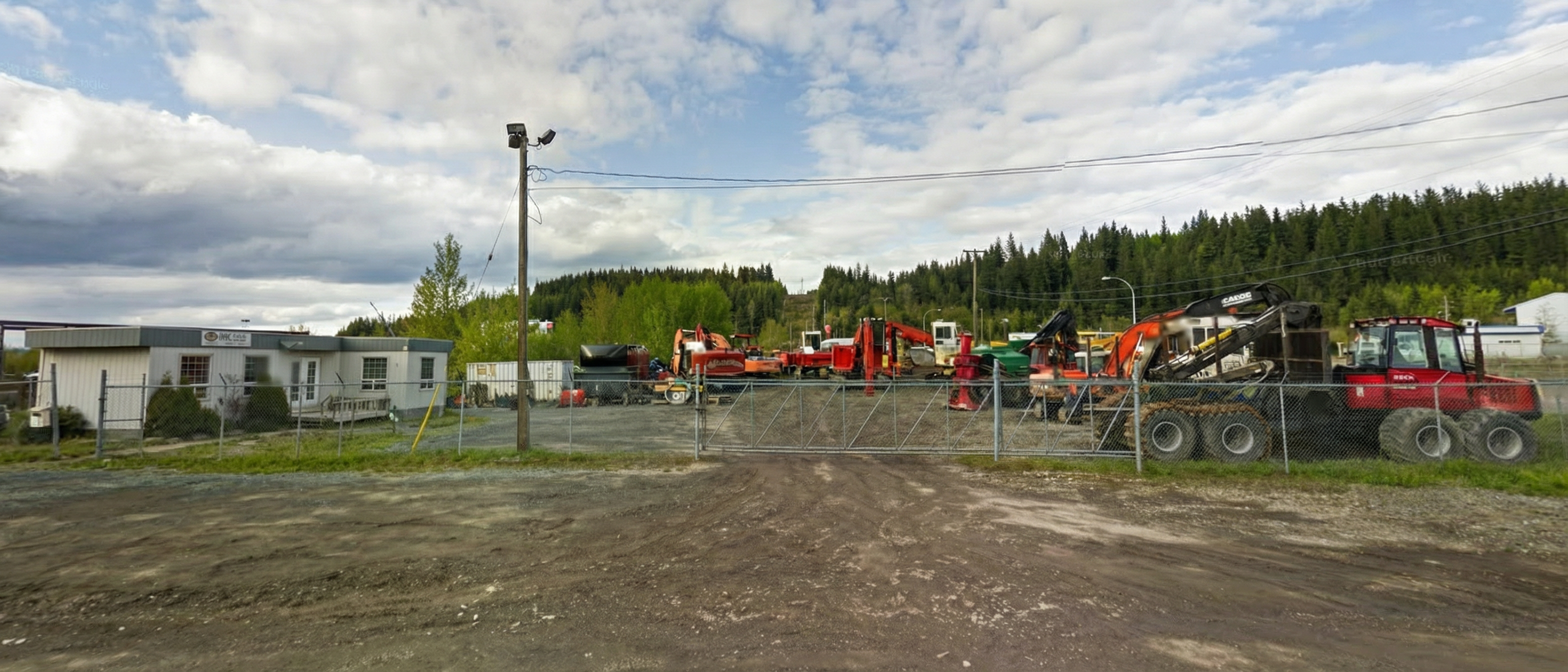 Hill Equipment Sales Ltd facility in Prince George BC with heavy equipment yard