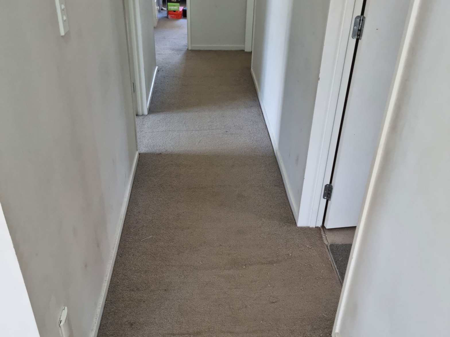 Hallway carpet before restretching service