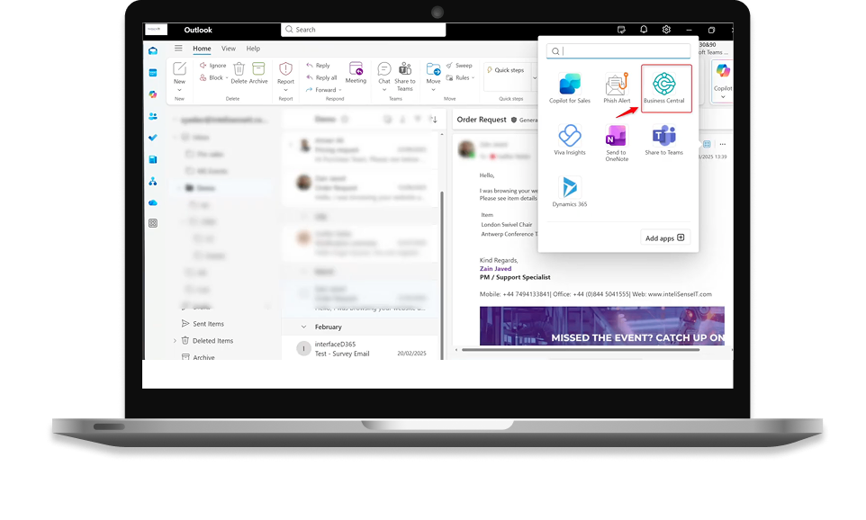 Laptop showing Outlook and Business Central