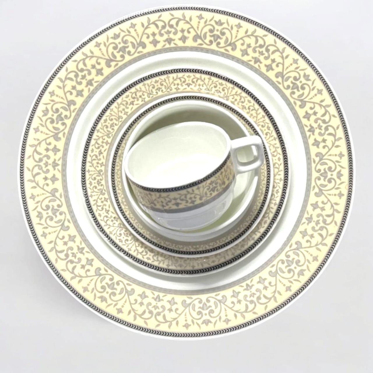 Premium crockery set with decorative plates and teacup