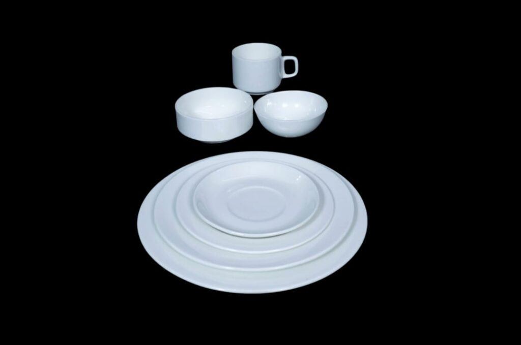 White crockery collection — plates, bowls and cups