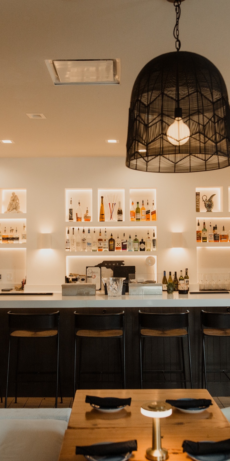 Bar counter with stools and pendant light